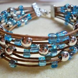Sea Of Silver Blue Bracelet On Brown Leather