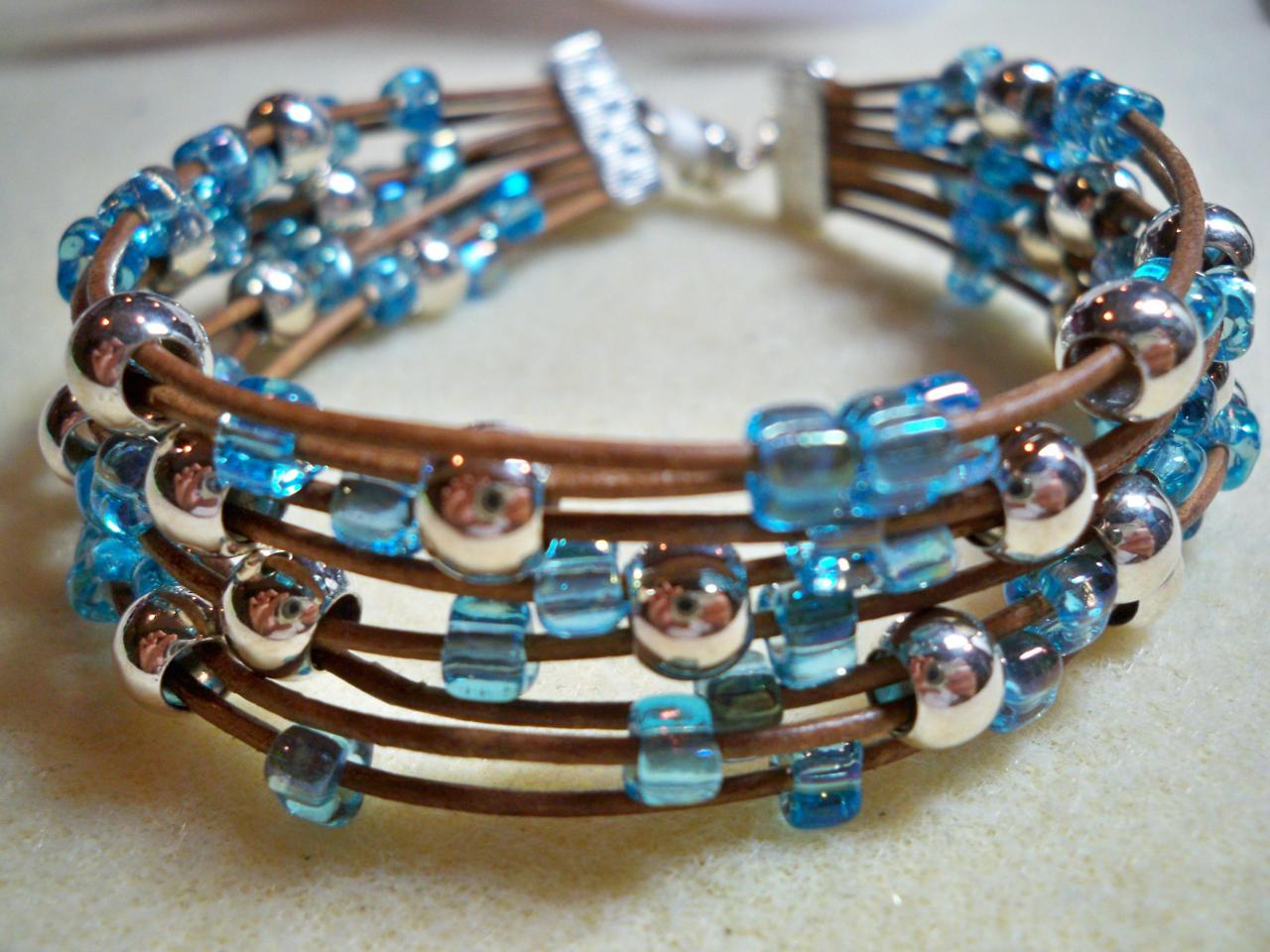 Sea Of Silver Blue Bracelet On Brown Leather